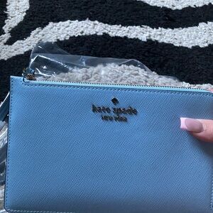 Kate spade wristlet, light blueish